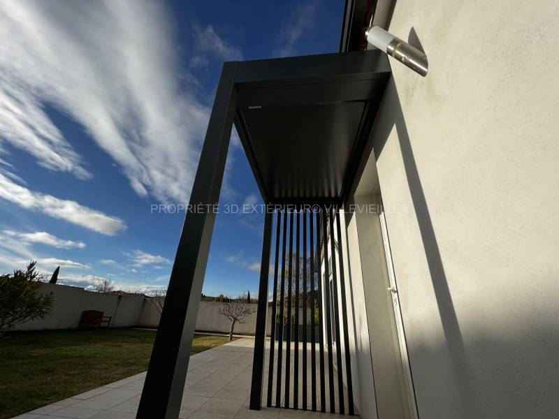 Installation sur mesure d'une marquise en aluminium à Monmirat (30)