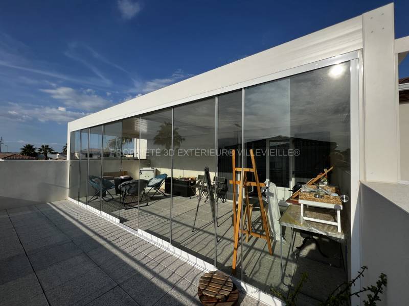 Pergola bioclimatique épurée et design vitrée storée près de Saint Laurent d'Aigouzes gard