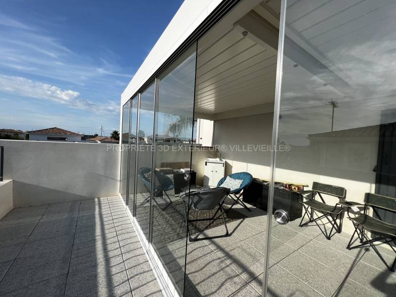 Transformez votre terrasse en jardin d'hiver avec nos verres panoramiques pour pergolas équipée par 3d Extérieur près de la Grande-Motte 34