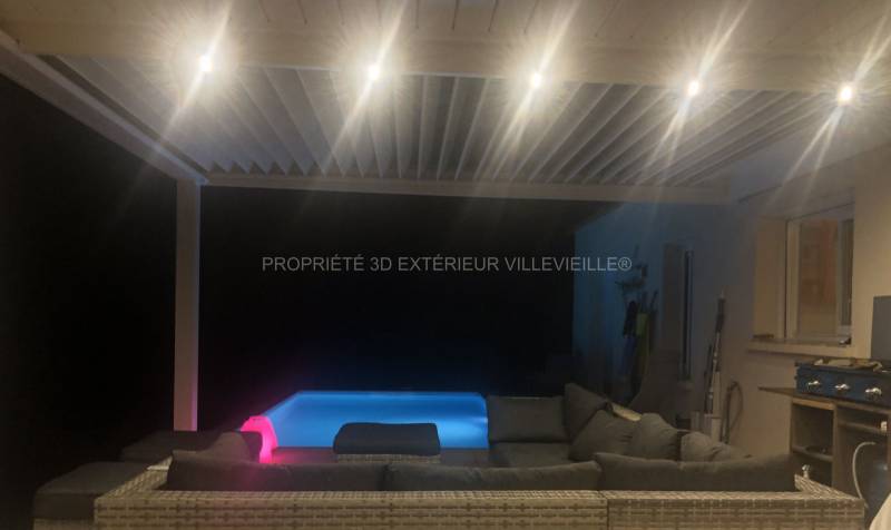 Option lumière  pour pergola bioclimatique ambiance de nuit sur terrasse de Sagone près d'Ajaccio en Corse 