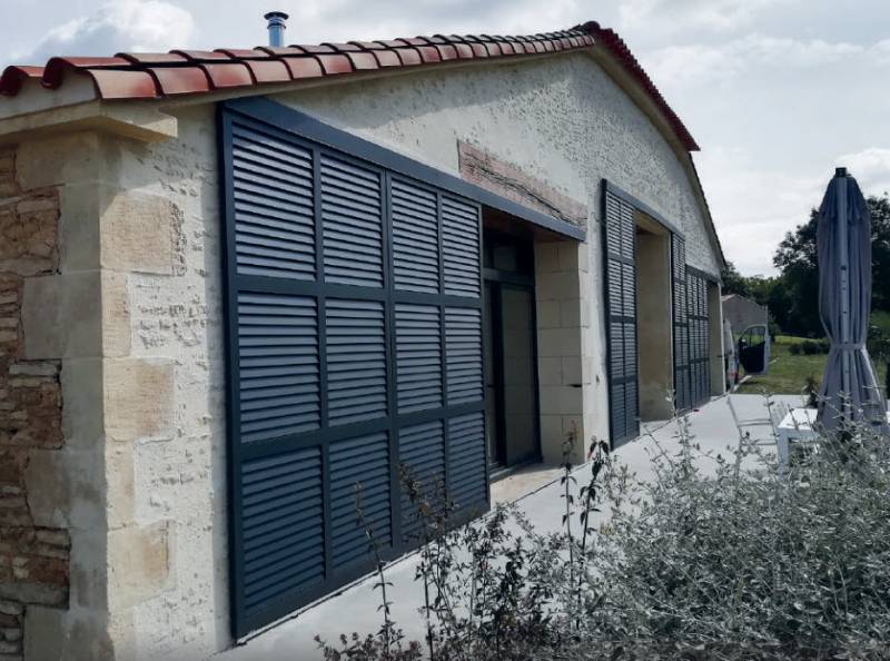 Vente et pose de volets coulissants en aluminium et bois région Gard et Hérault