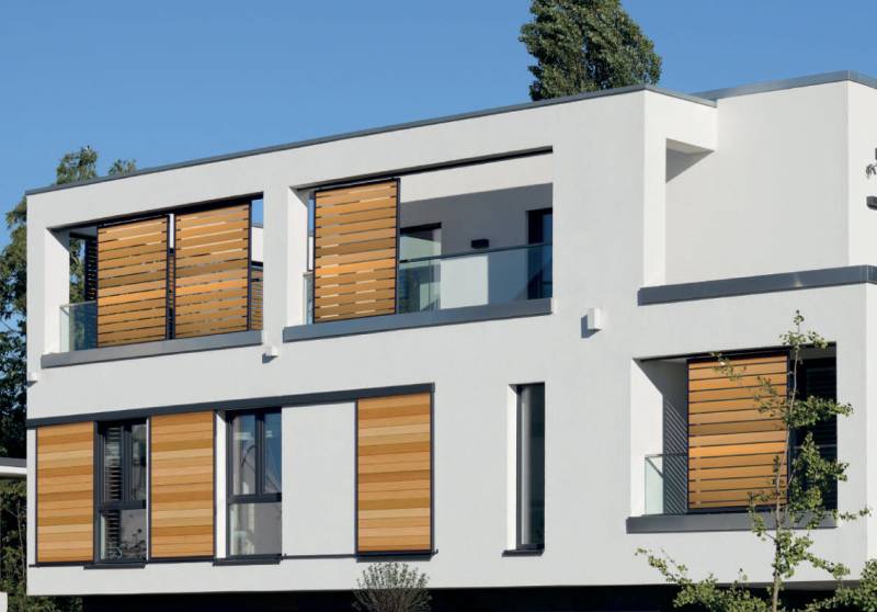 Alliance du bois et de l'aluminium pour des volets coulissants de haute qualité Sommières Gard