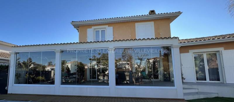 Création jardin d'hiver avec pergola Solisystème fermée avec vitrage sur Aigues-Mortes Gard