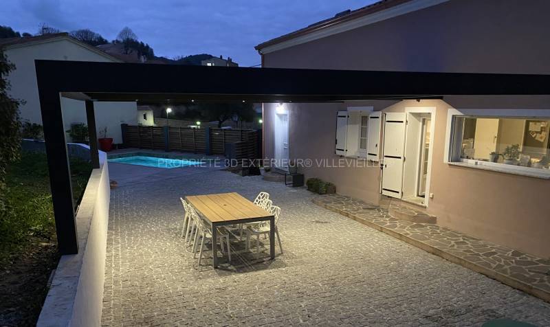 Réalisation pergola lames orientables lumière intégrée près d'Ajaccio Corse du Sud