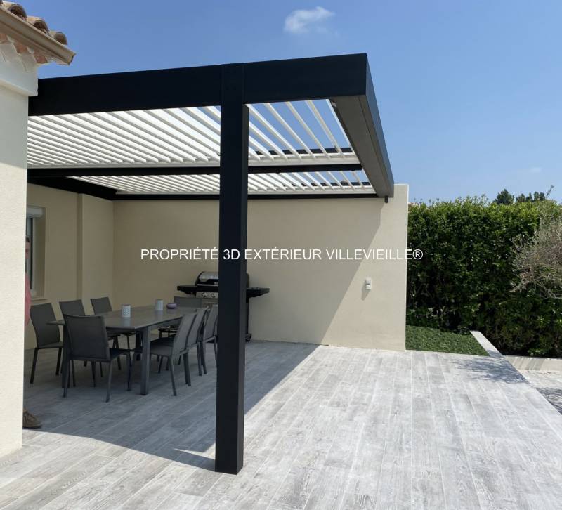 Implantation et pose d'une pergola bioclimatique noire structurée en alu à Pierrelatte dans la Drôme près de l'Ardèche
