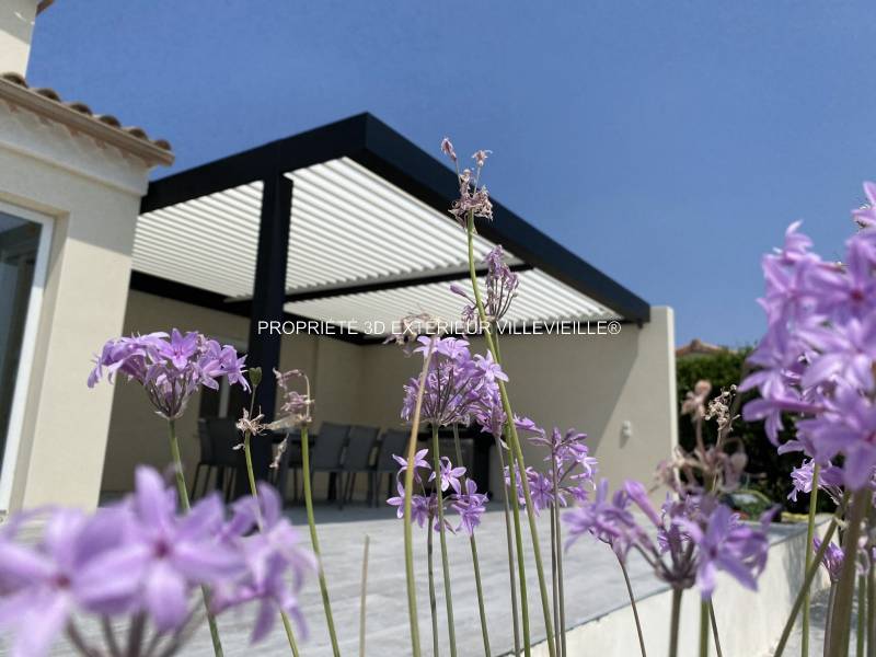 Installation d'une pergola bioclimatique adossée sur 3 murs à Pierrelatte dans la Drôme